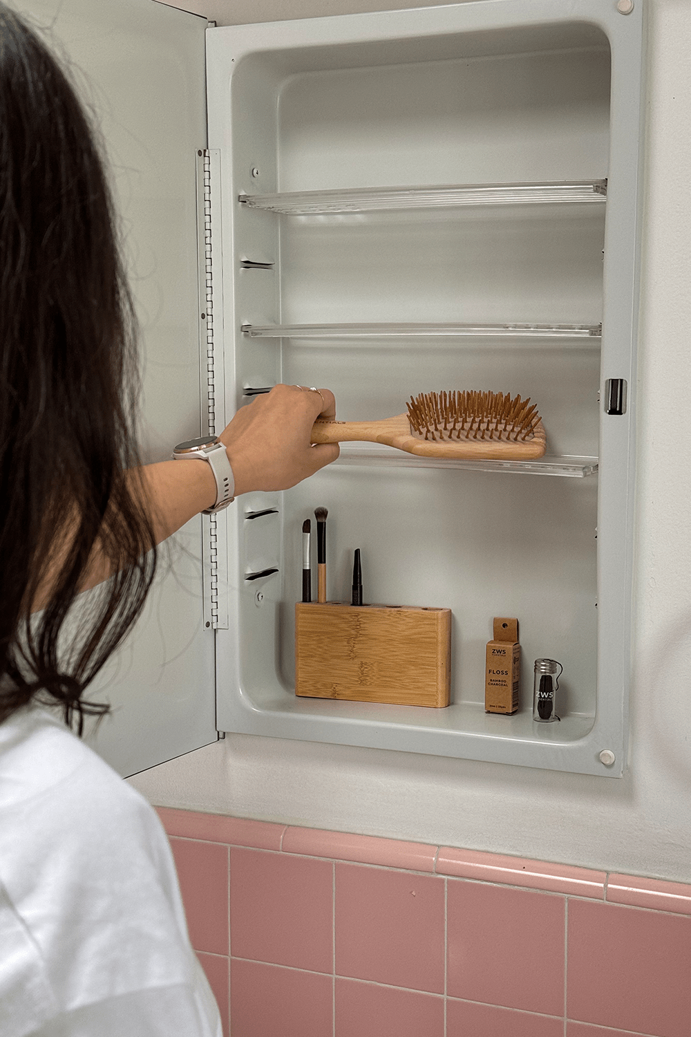 bamboo hair brush in bathroom cabinet