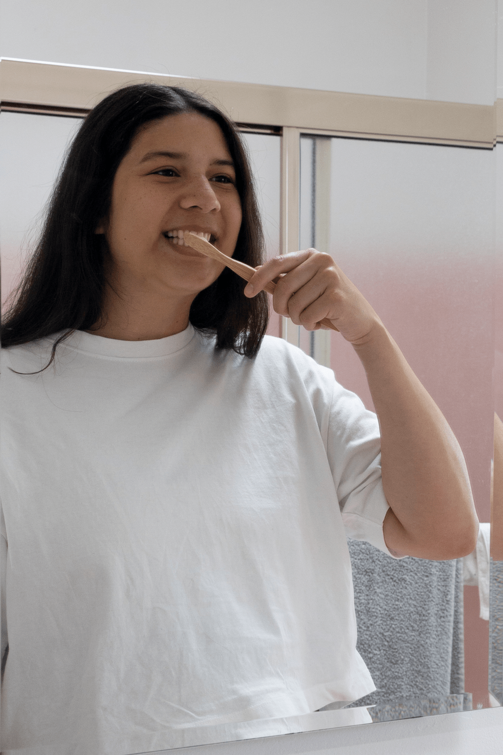 girl-brushing-her teeth-with-bamboo-toothbrush.png__PID:64e3735f-0764-40d9-a6c8-ae85be8611f6