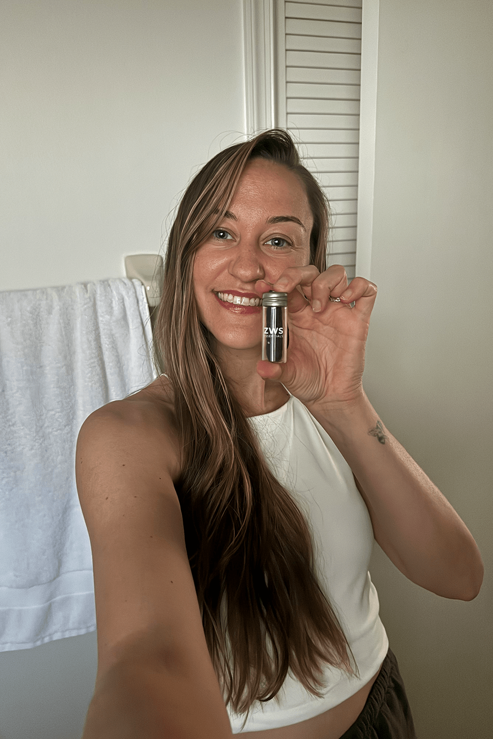 model holding bamboo charcoal floss in bathroom model holding bamboo charcoal floss in bathroom