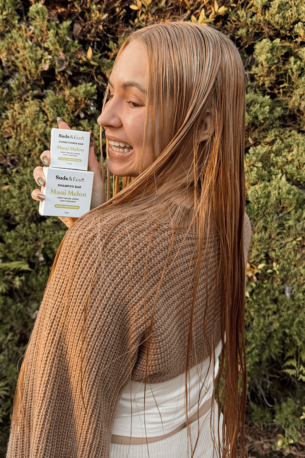 paige holding shampoo conditioner bars