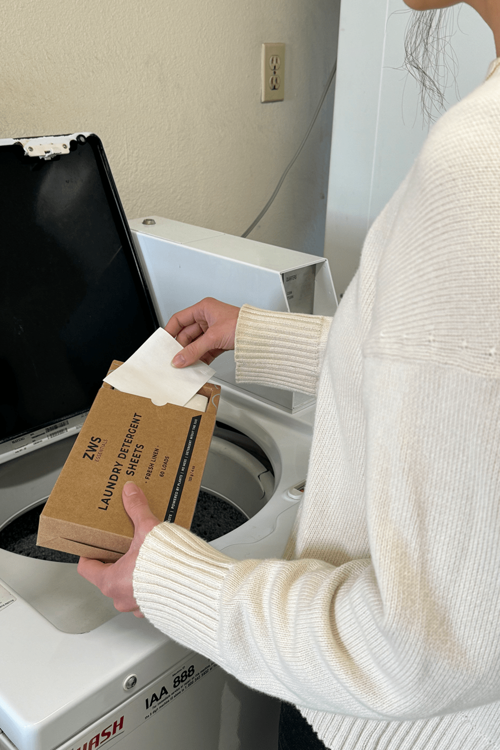 women using laundry detergent sheets women using laundry detergent sheets